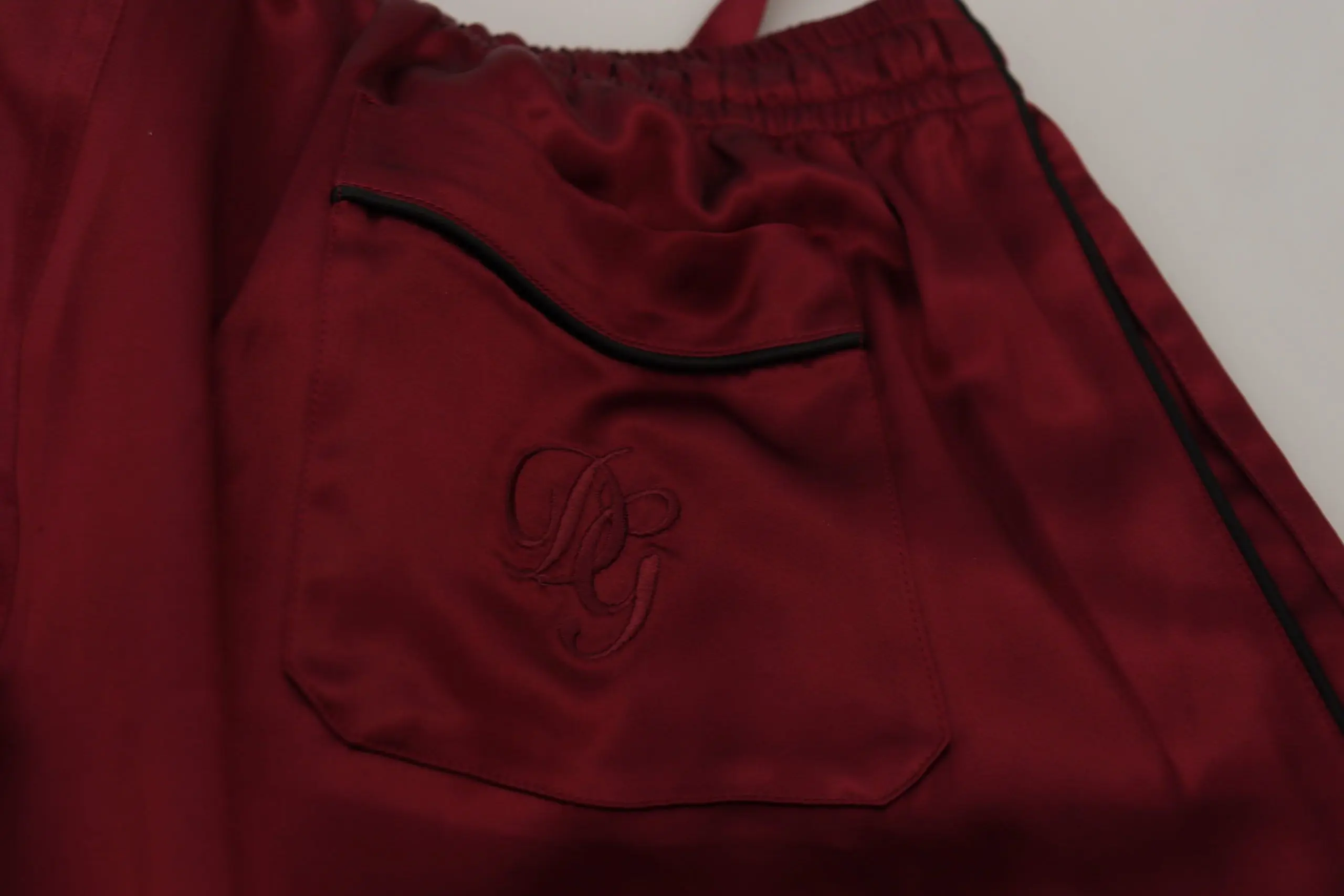 Повседневные брюки Dolce & Gabbana Бордовые шелковые брюки 'Сон и Отдых'