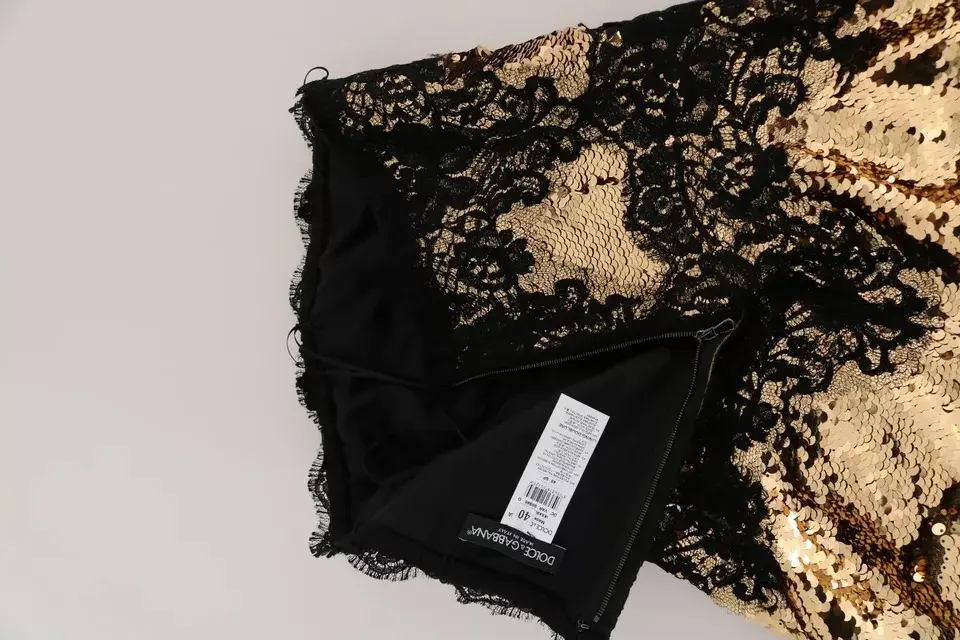 Dolce & Gabbana oltin rangli strapless payetli dantelli ko'ylak