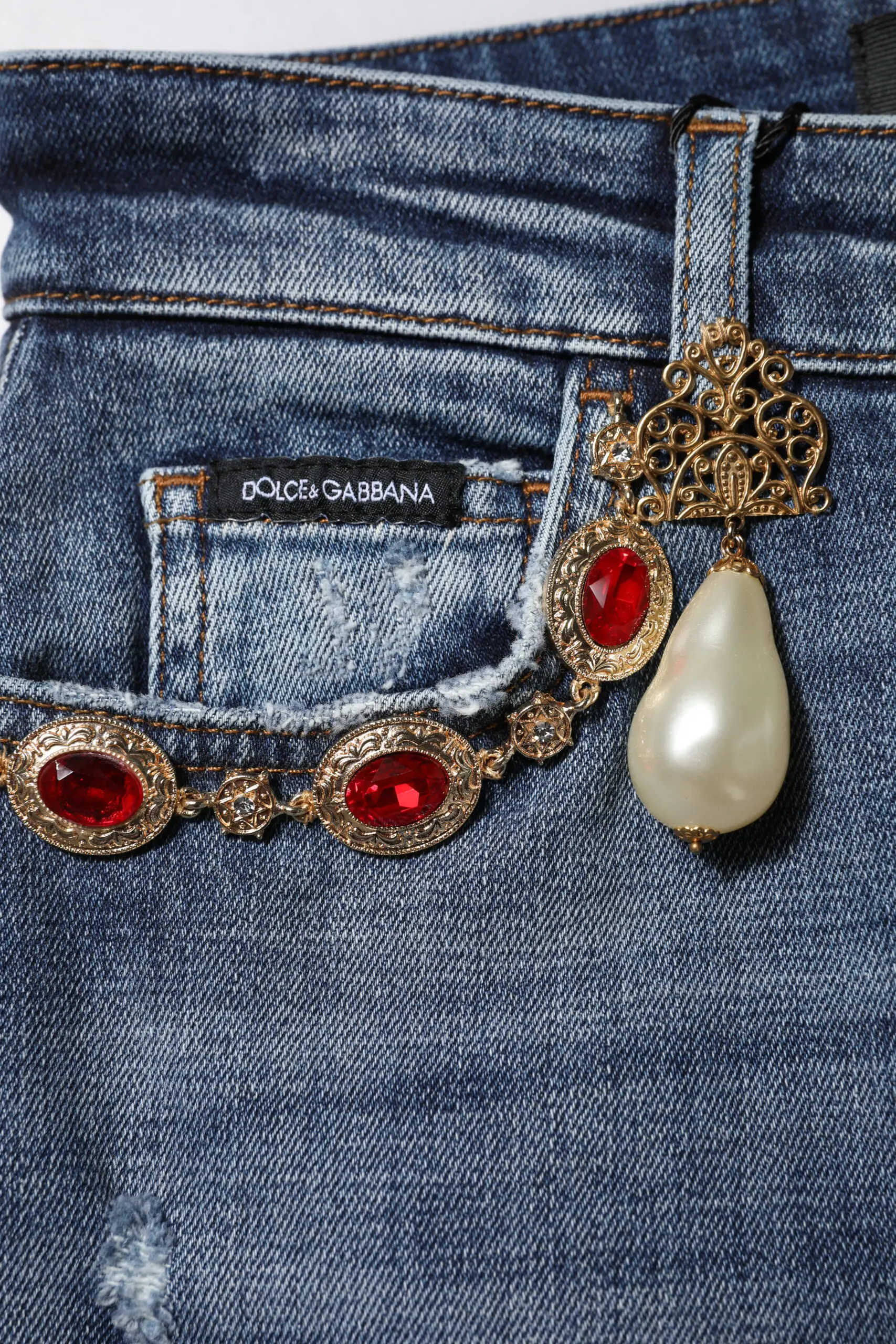 Dolce & Gabbana ko'k rangli jingalak bezakli jinisi