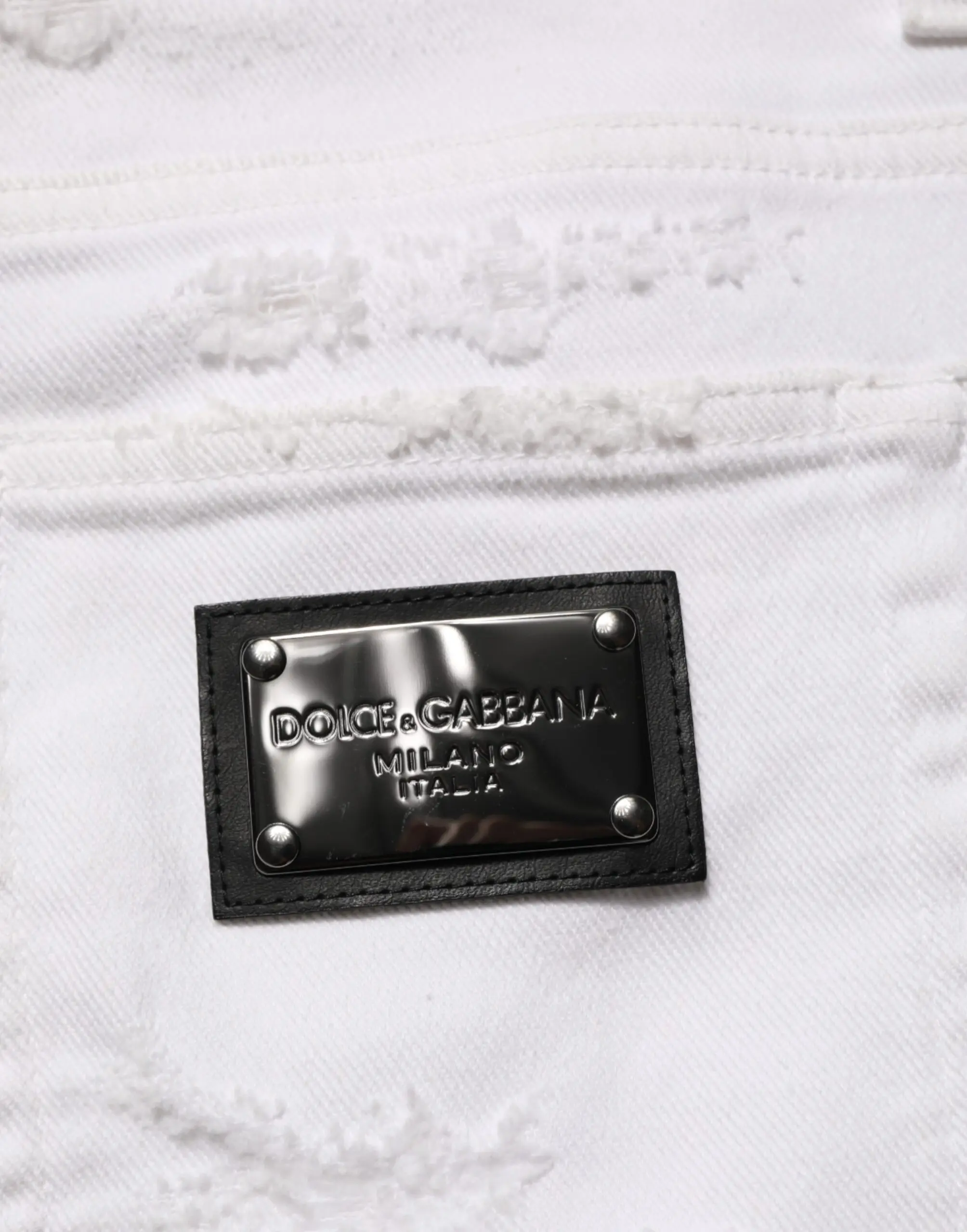 Белые рваные джинсы Dolce & Gabbana